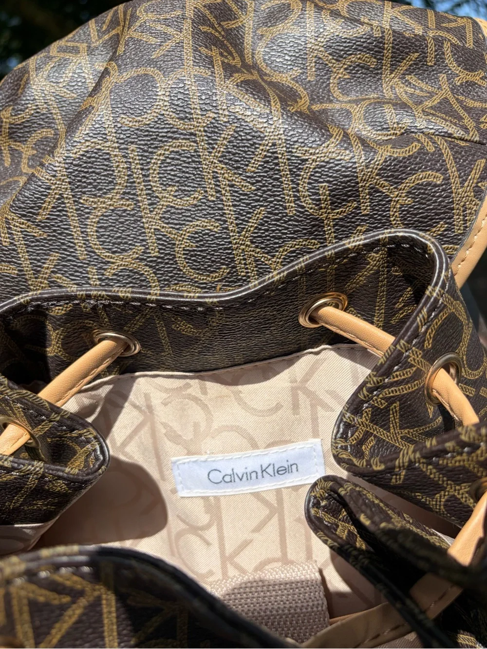 Calvin Klein Brown Monogram Canvas Backpack with Tan Trim